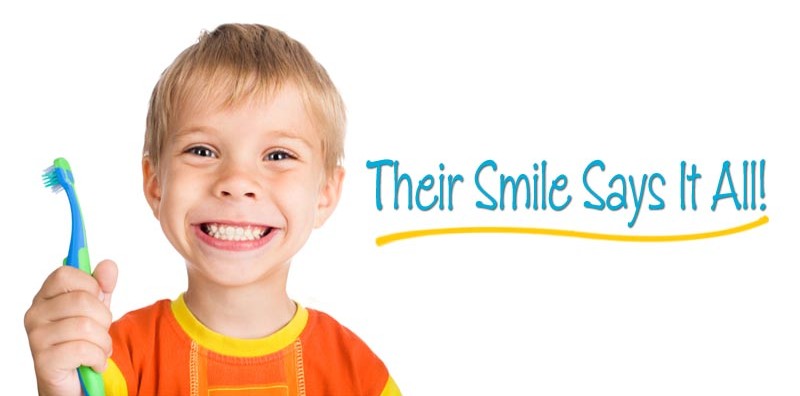 Pediatric-Dental-Assistant-School-kid-smiling-with-toothbrush