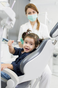 Dentist and child patient